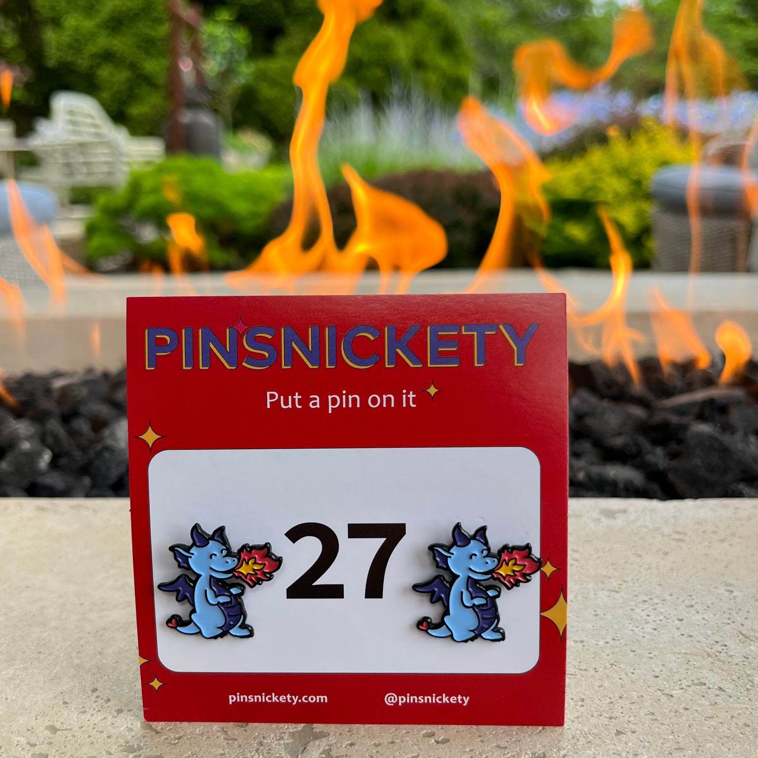 pinsnickety dragon horse show number pins in front of a fire pit