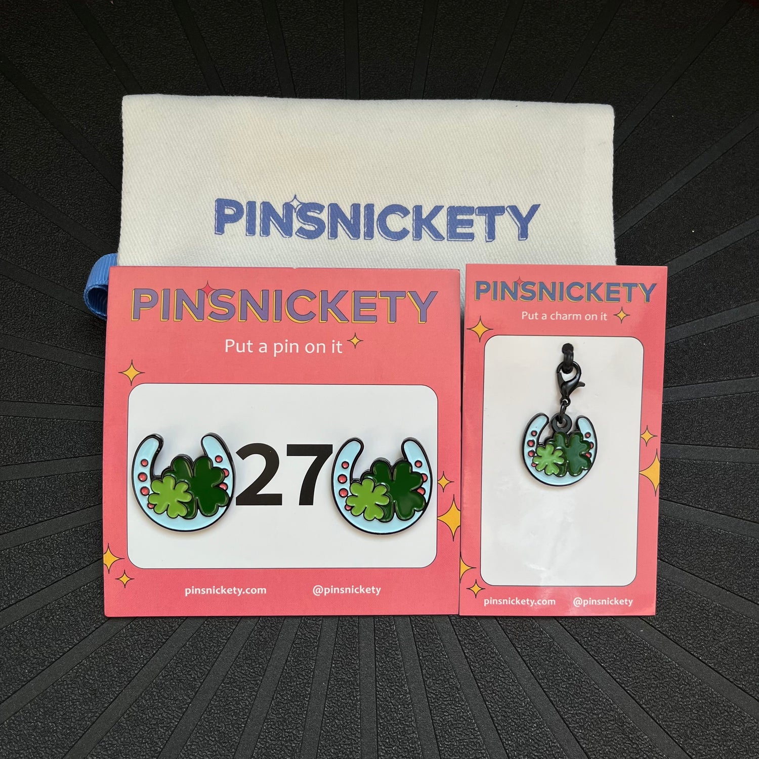 pinsnickety horse shoe matching set, featuring horse show number pins, a braid and bridle charm, and a Pinsnickety twill storage bag