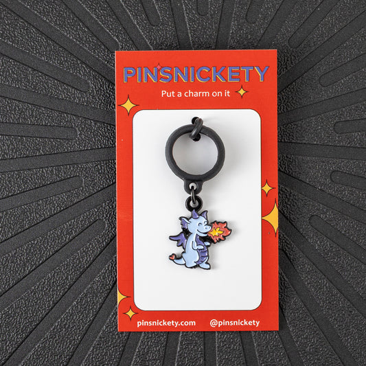 Pinsnickety Dragon crop charm in front of a black background