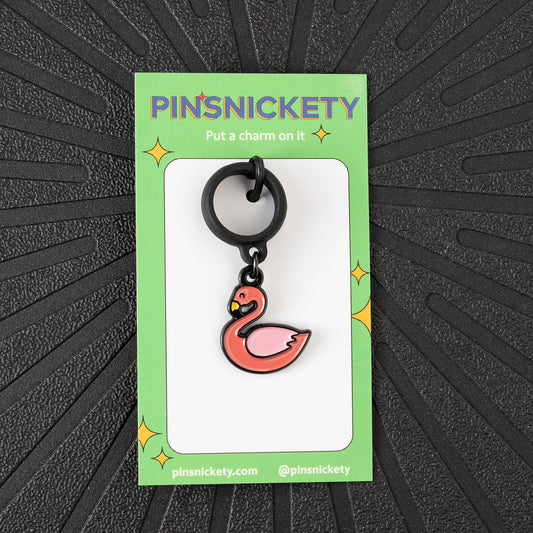 Pinsnickety Flamingo crop charm in front of a black background