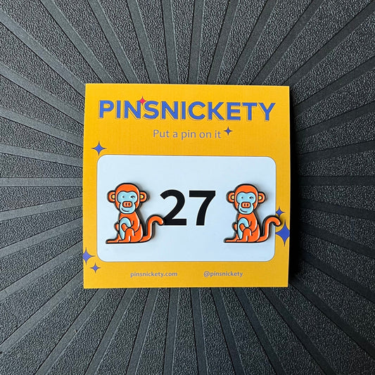 pinsnickety monkey horse show number pins on a black background