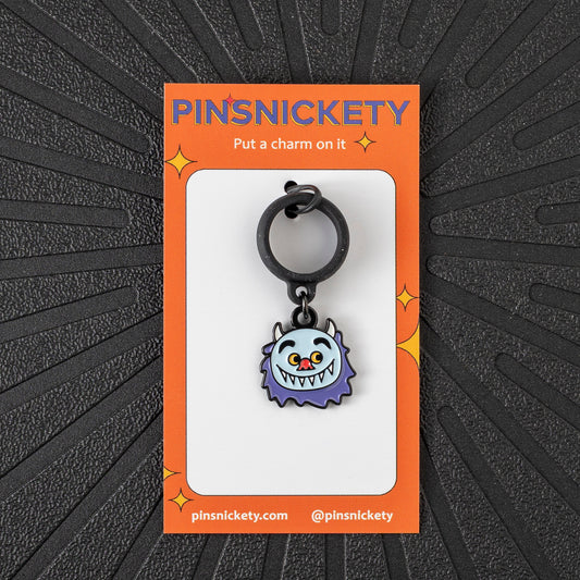 Pinsnickety Wild Thing crop charm in front of a black background