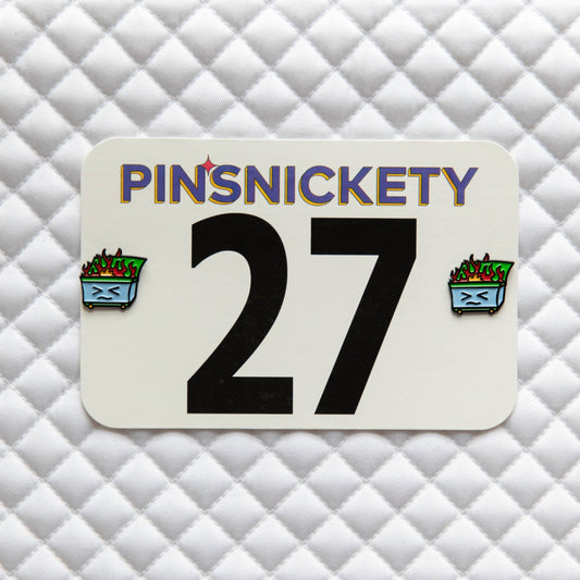 Pinsnickety Dumpster Fire horse show number pins on a saddle pad