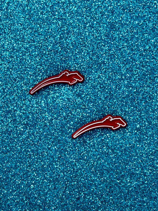 pinsnickety custom ushja horse show number pins on a glittery blue background