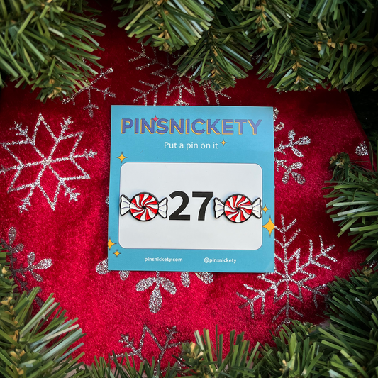 pinsnickety peppermint horse show number pins on a background of red and green for christmas gifts