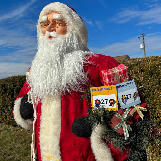 santa carrying two sets of pinsnickety horse show number pins in his gift sack