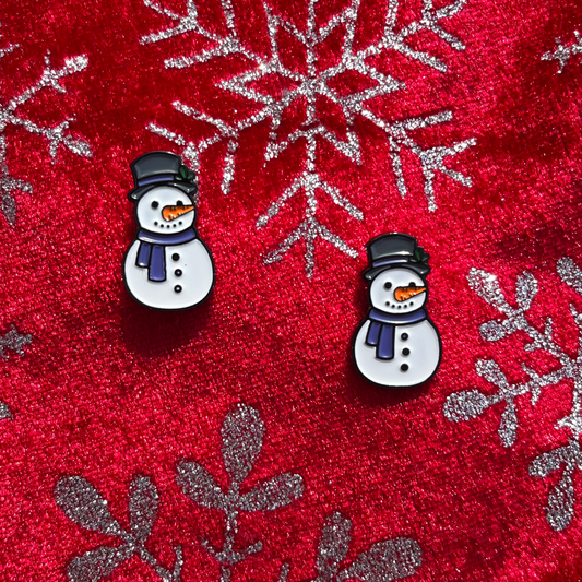 pinsnickety snowman horse show number pins on a red fabric background with silver snowflakes