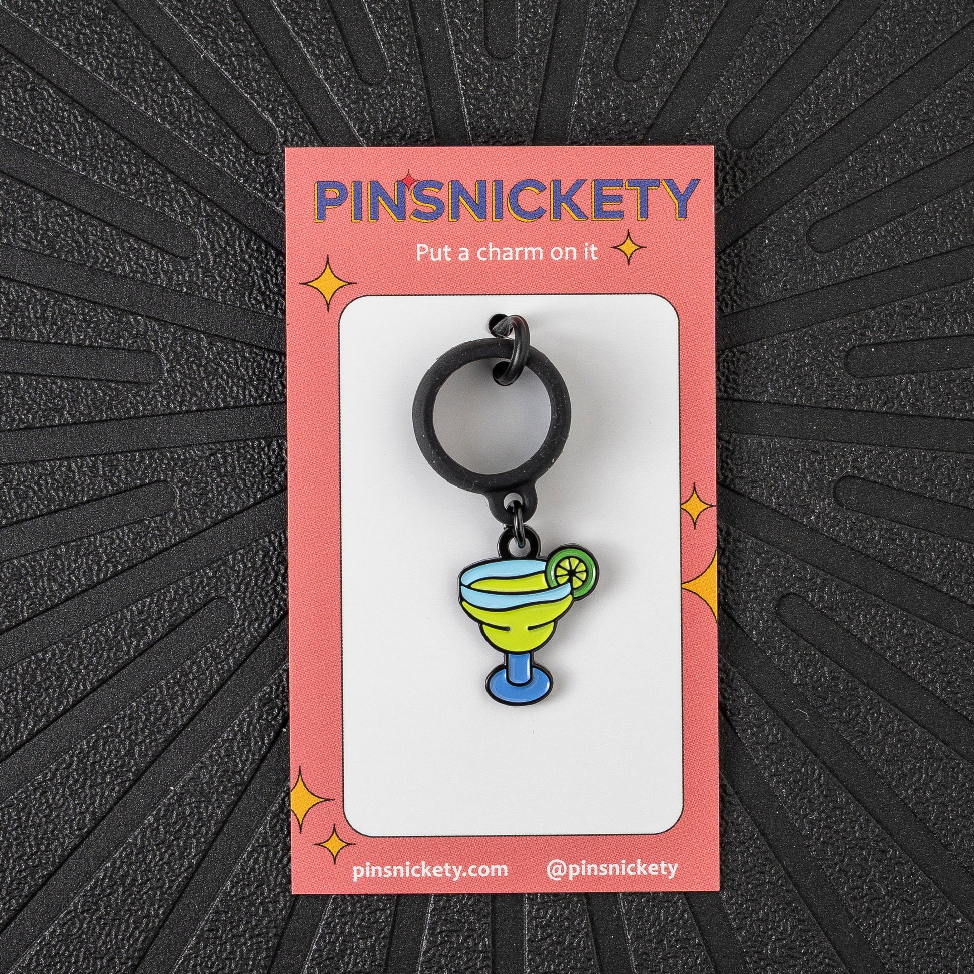 Pinsnickety Margarita crop charm in front of a black background