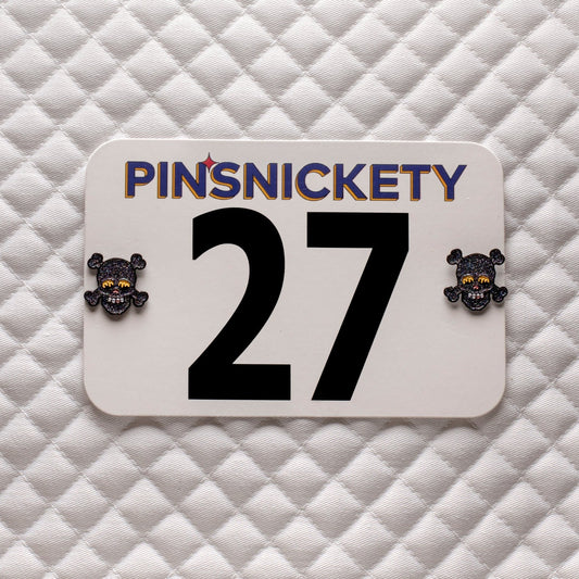pinsnickety special edition black glitter skull horse show number pin on a saddle pad