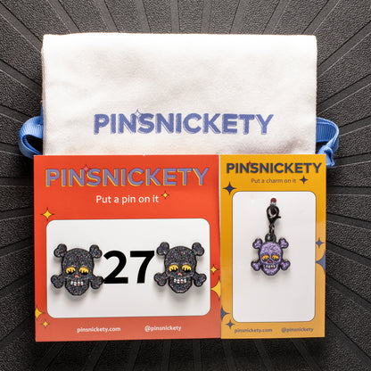 Pinsnickety color combo skull  set with black glitter horse show number pins and purple glitter skull braid and bridle charm with a Pinsnickety twill storage bag