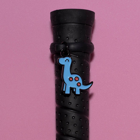 Pinsnickety Brontosaurus crop charm on a whip handle in front of a colored background