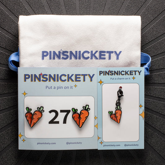 pinsnickety carrots matching set, featuring carrots horse show number pins, a carrots bridle charm and a pinsnickety twill bag