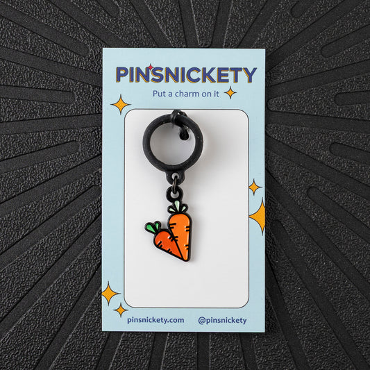 Pinsnickety Carrots crop charm in front of a black background