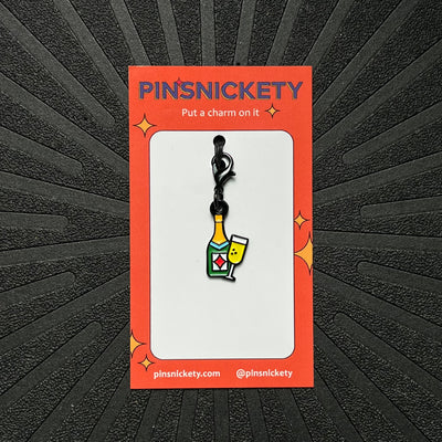 pinsnickety champagne braid and bridle charm on a black background