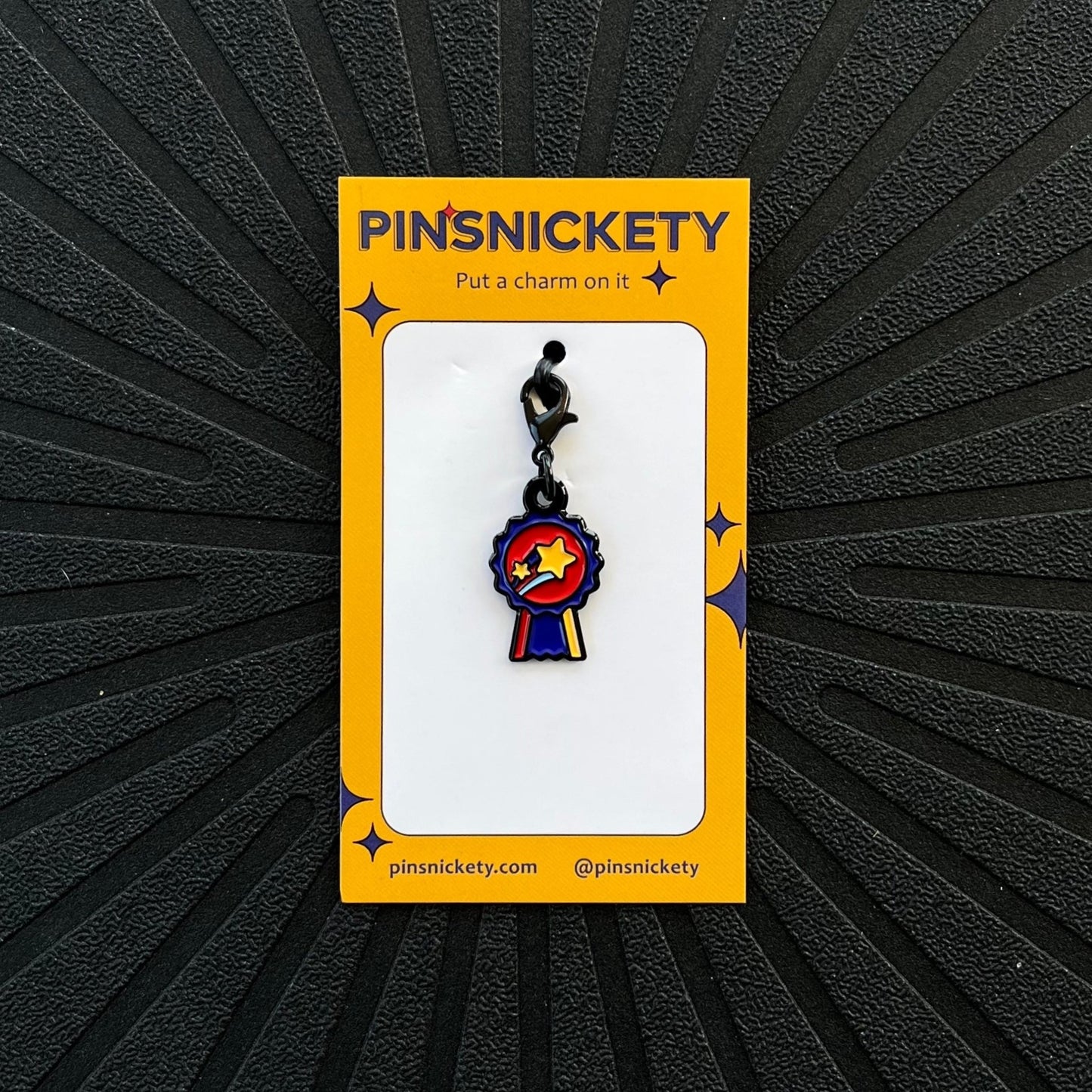 pinsnickety champion braid bridle bonnet charm on a black background
