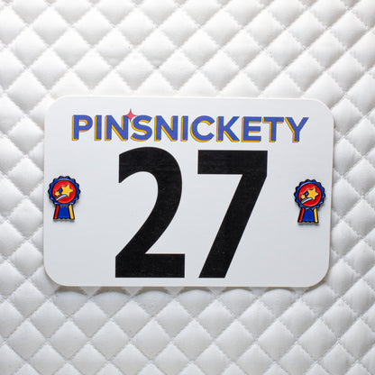 pinsnickety champion horse show number pins on a saddle pad