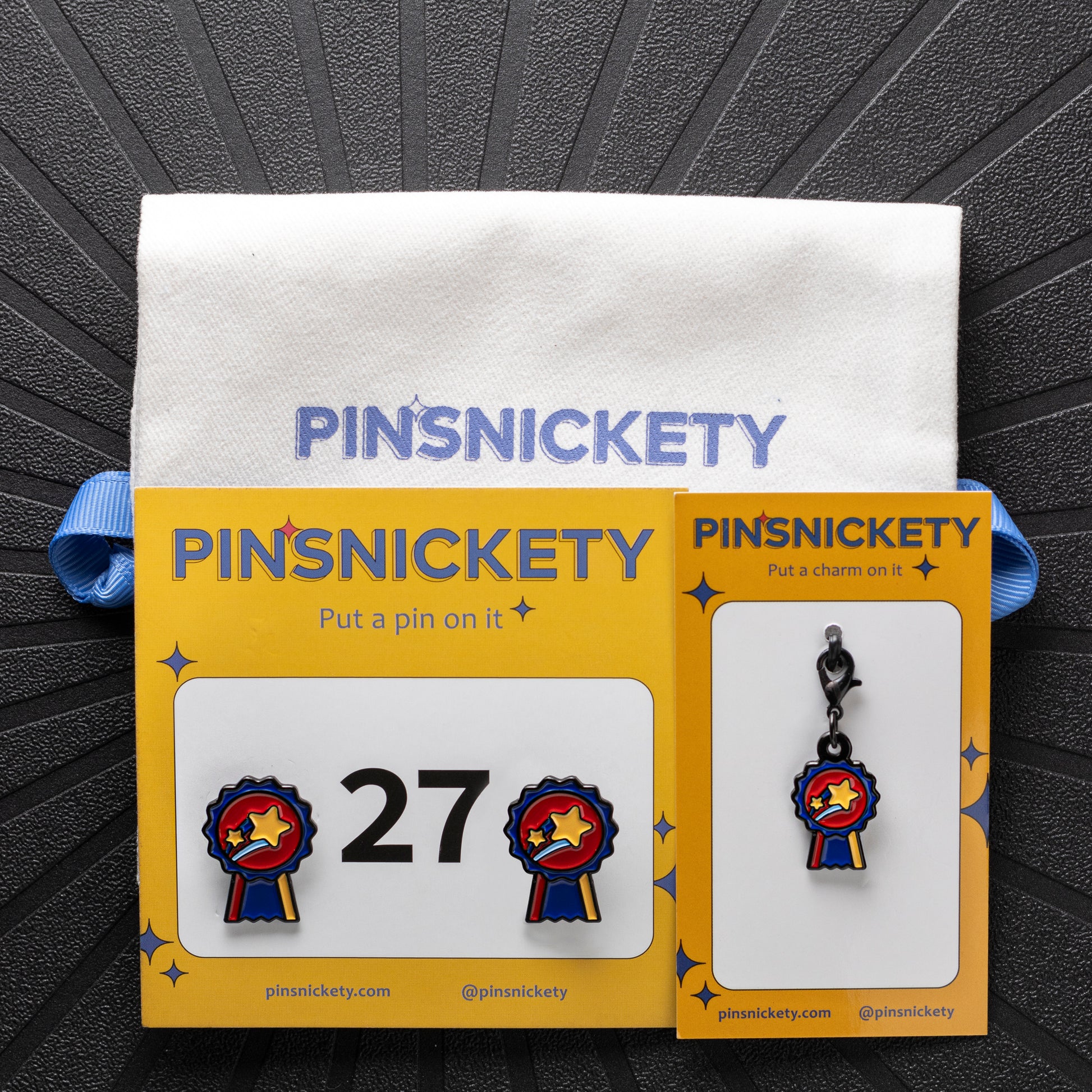 pinsnickety champion horse show number pins and braid and bridle charm set with a twill storage bag on a black background