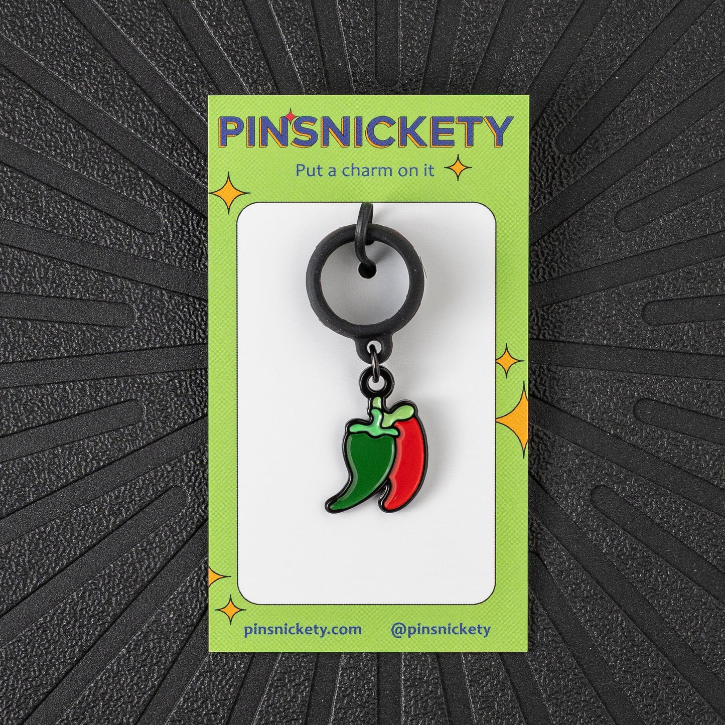 Pinsnickety Chili Peppers crop charm in front of a black background