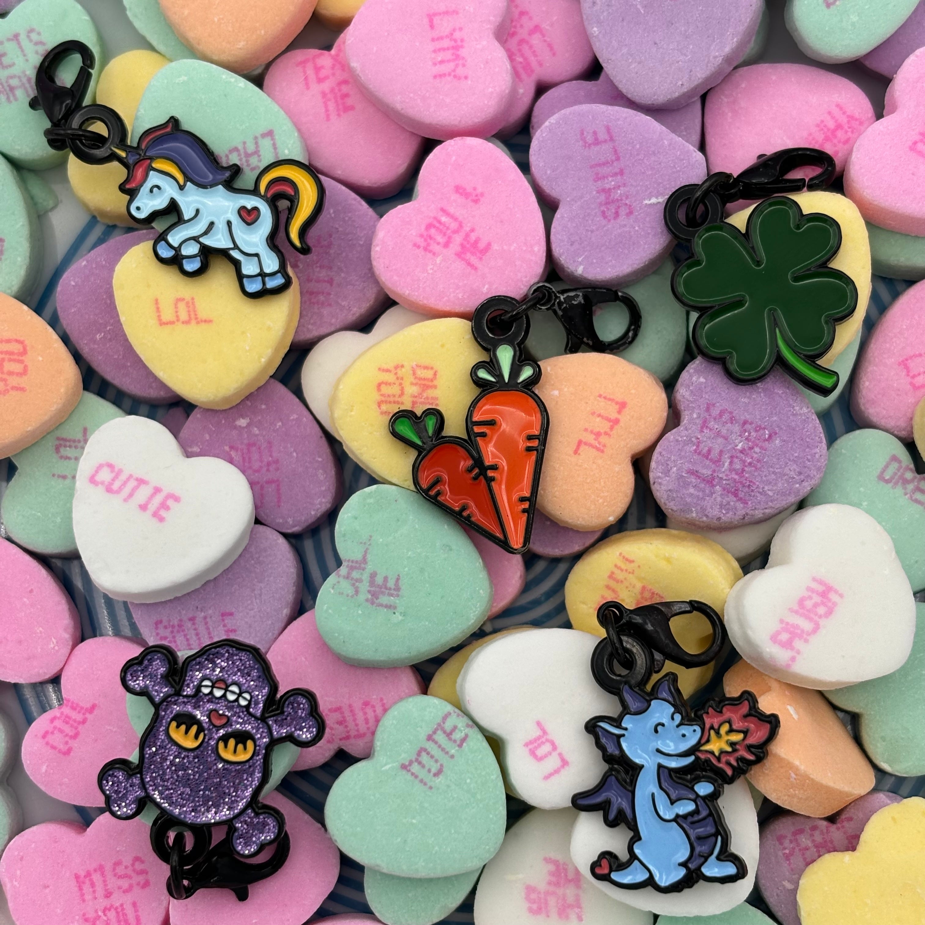 pinsnickety charms with hearts for valentine's day on a background of conversation heart candies