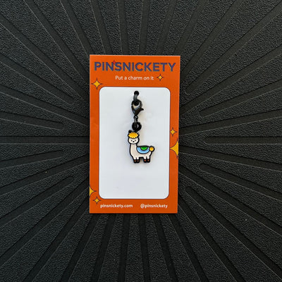 pinsnickety drama llama braid bridle or bonnet charm on a black background
