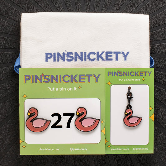 pinsnickety flamingo set, featuring a flamingo bridle charm, flamingo horse show number pins and a pinsnickety twill storage bag