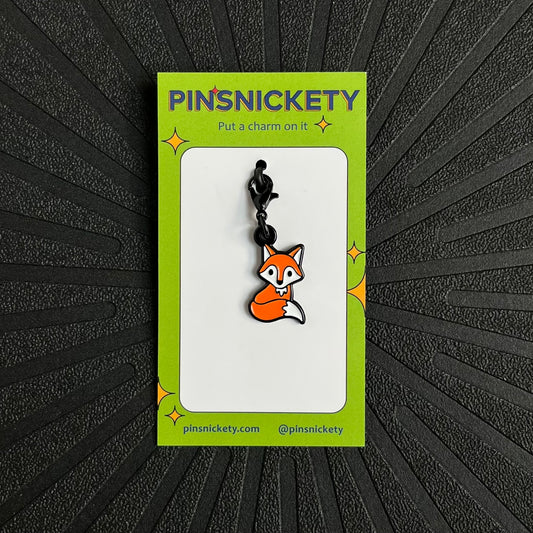 pinsnickety fox braid and bridle charm on a black background
