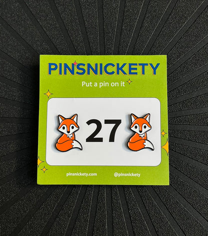 pinsnickety fox horse show number pins  on a black background