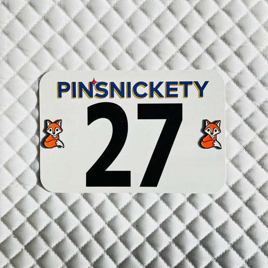 Pinsnickety Fox horse show number pins on a saddle pad