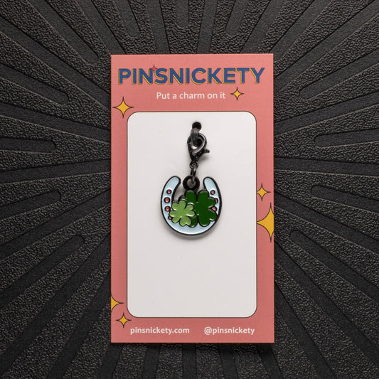 pinsnickety horseshoe braid and bridle charm on a black background