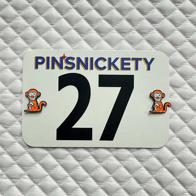 pinsnickety monkey horse show number pins on a saddle pad