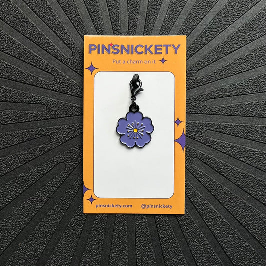 pinsnickety purple poppy bridle charm on a black background