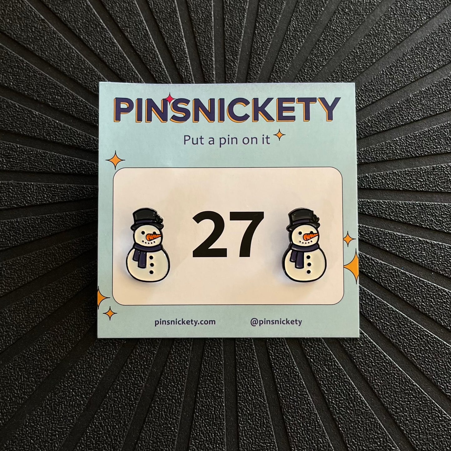 pinsnickety snowman horse show number pins on a black background