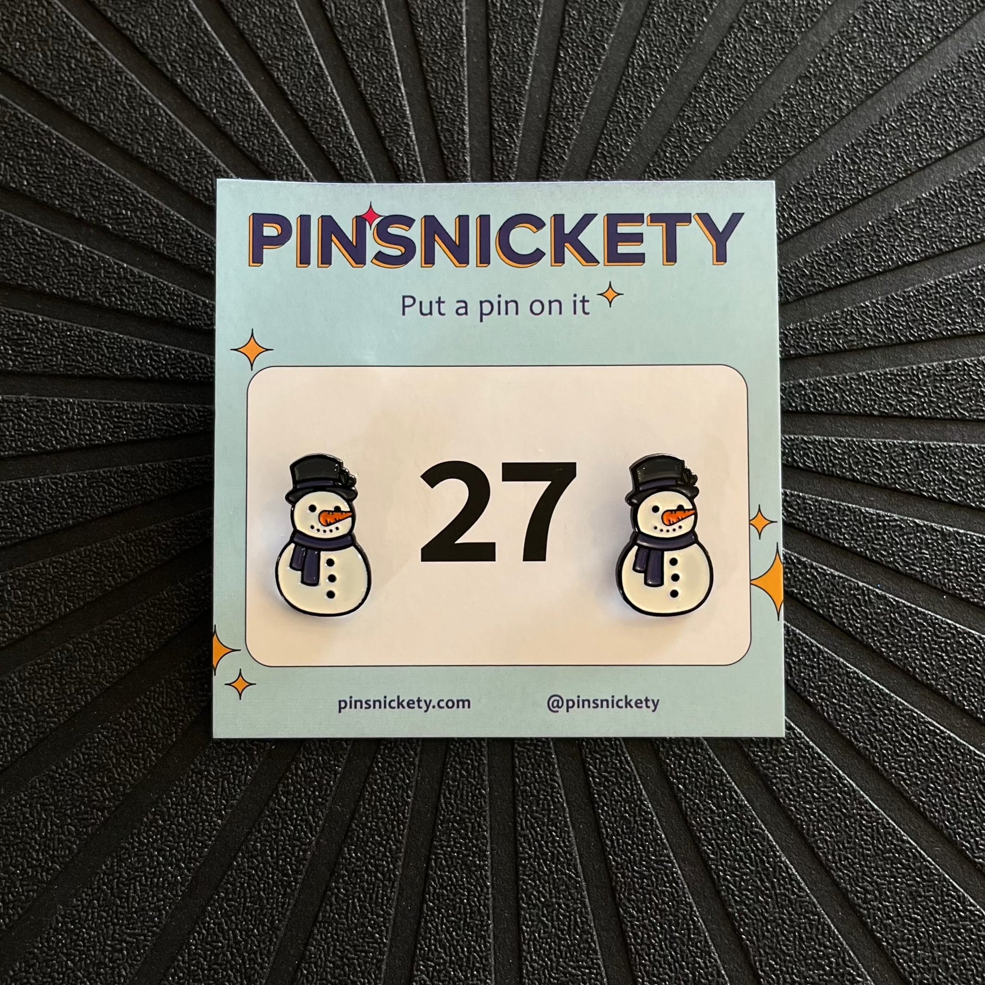 pinsnickety snowman horse show number pins on a black background