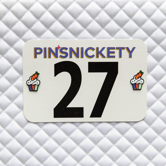 Pinsnickety Cupcake horse show number pins on a saddle pad