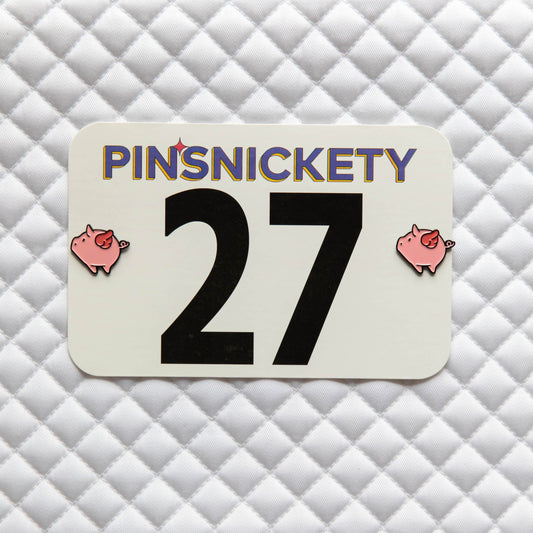 Pinsnickety Flying Pig horse show number pins on a saddle pad