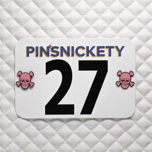 pinsnickety skull special edition pink horse show number pins on a saddle pad