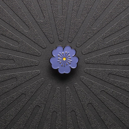 pinsnickety purple poppy horse show number pin on a black background