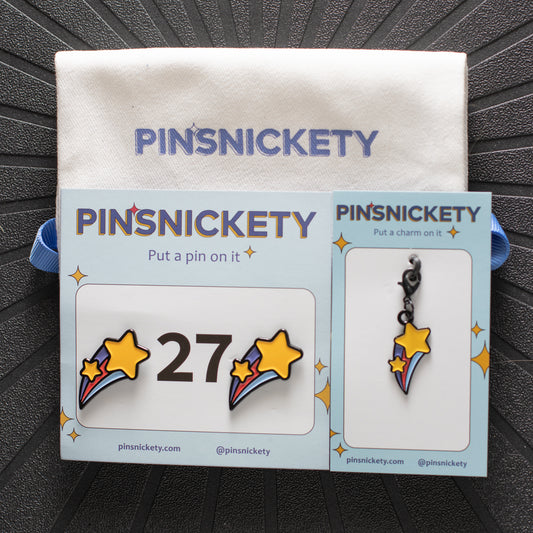 Pinsnickety shooting star horse show number pins and charms on their product packaging cards