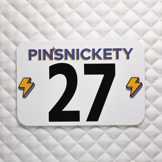 pinsnickety lightning bolt horse show number pins in special edition electric yellow on a saddle pad